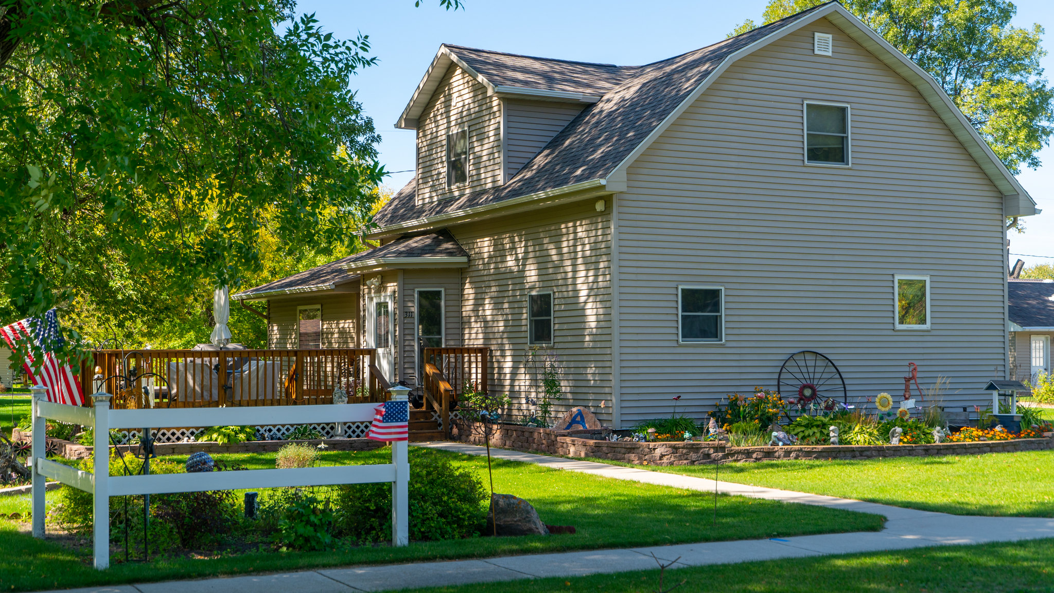 a home in Pekin, ND with nice landscaping.